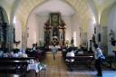 Interior de San Cipriano y ofrenda a San Isidro